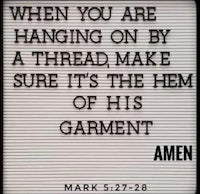 a sign that says when you are hanging on a thread, make sure it's his garment